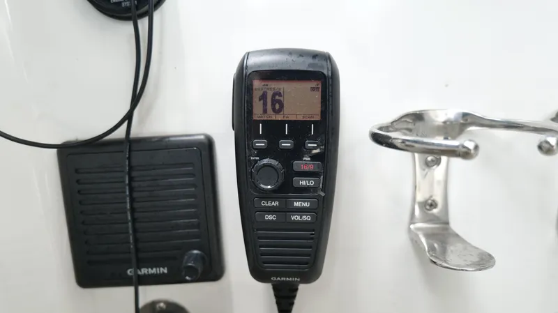 Slide: The Image of Garmin marine radio on a 2015 Cobalt A40 boat dashboard. - 40