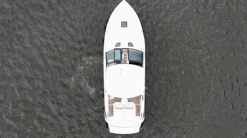 Slide: The Image of Aerial view of 2015 Cobalt A40 boat on water. - 8