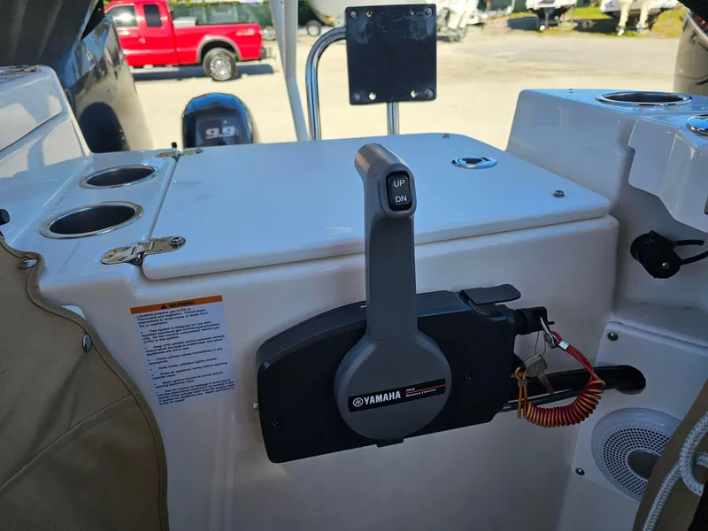 Slide: The Image of 2023 Ranger Tugs 27R boat control panel with Yamaha throttle lever. - 13