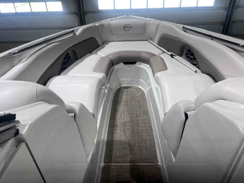 Slide: The Image of 2015 Crownline 285 SS boat interior with plush seating and modern design. - 34