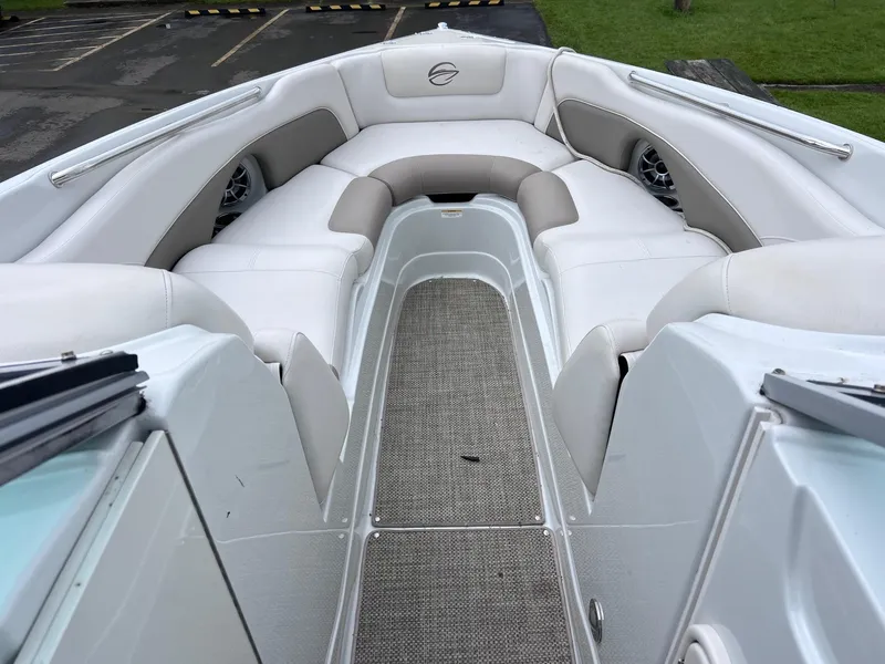 Slide: The Image of 2015 Crownline 285 SS boat interior with spacious seating and modern design. - 6