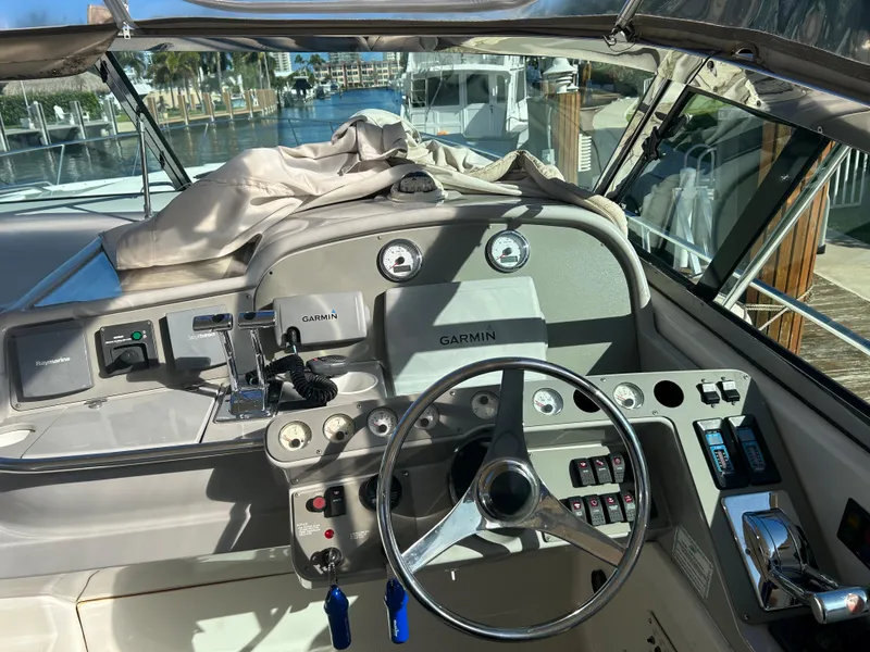 Slide: The Image of Cockpit of 2001 Formula 41 PC boat with Garmin navigation system and steering wheel. - 21