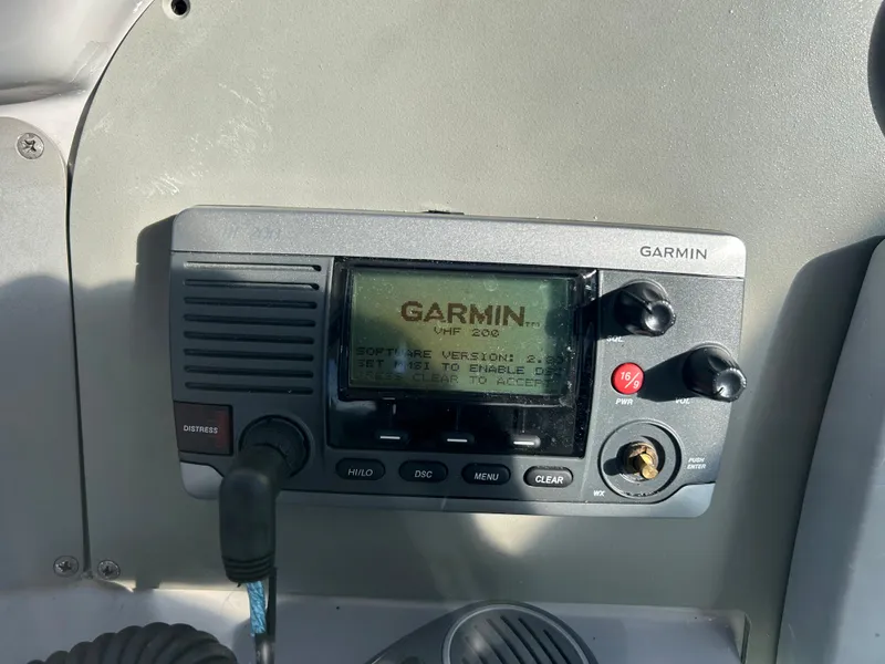 Slide: The Image of Garmin VHF 200 radio on 2001 Formula 41 PC boat dashboard. - 26