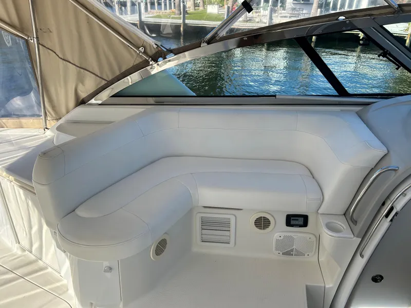 Slide: The Image of Luxurious seating area on a 2001 Formula 41 PC yacht, featuring white upholstery. - 33