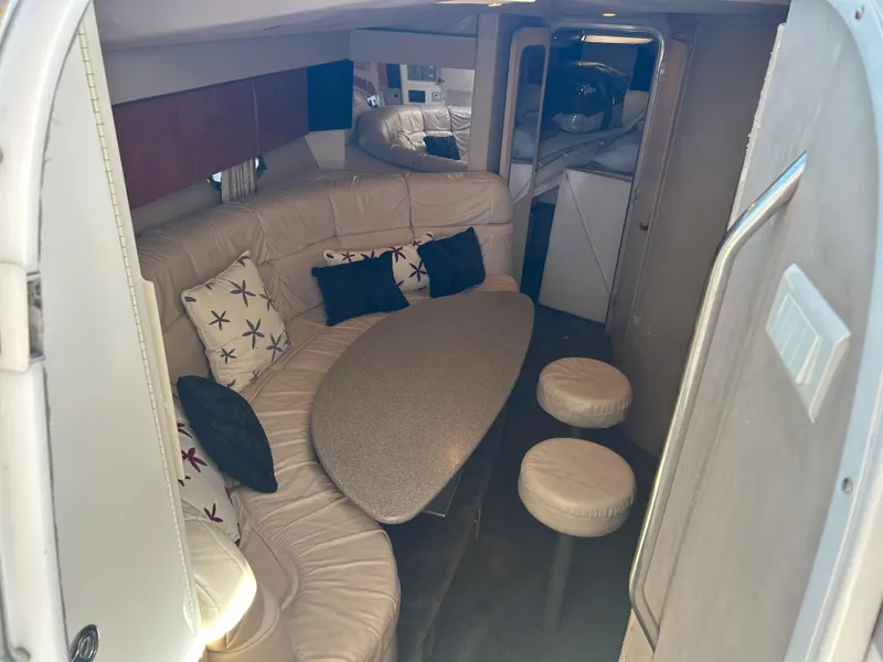 Slide: The Image of Interior of 2001 Formula 41 PC yacht with beige seating and decorative pillows. - 37