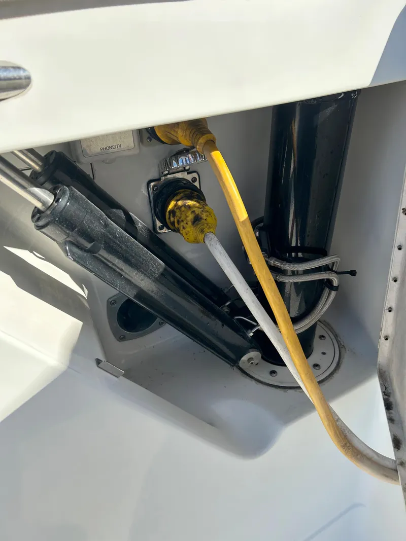 Slide: The Image of 2001 Formula 41 PC boat engine compartment with cables and hydraulic components. - 4