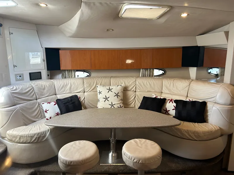 Slide: The Image of Interior of 2001 Formula 41 PC yacht with plush seating and decorative pillows. - 41