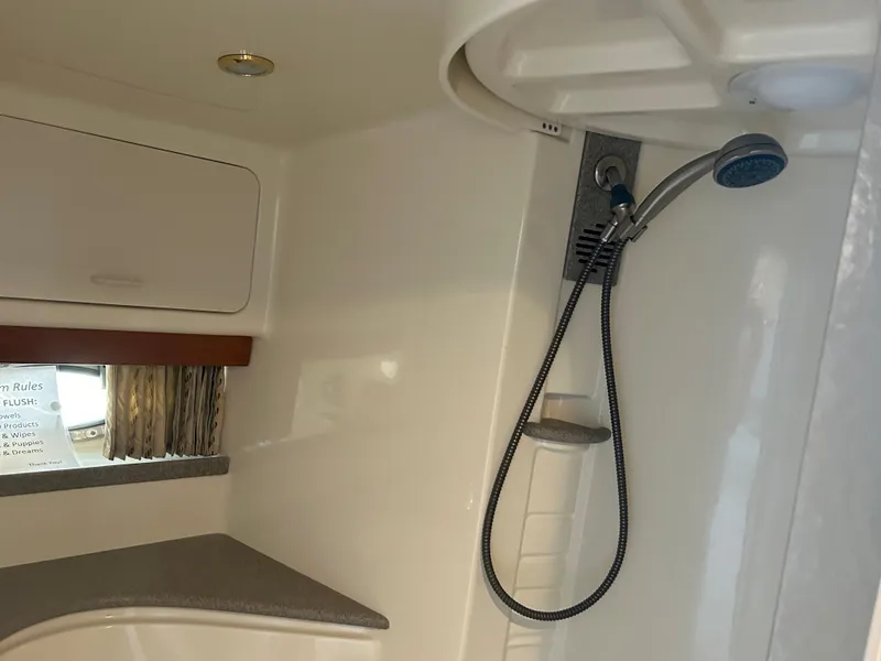 Slide: The Image of Interior of 2001 Formula 41 PC yacht bathroom with shower and countertop. - 47