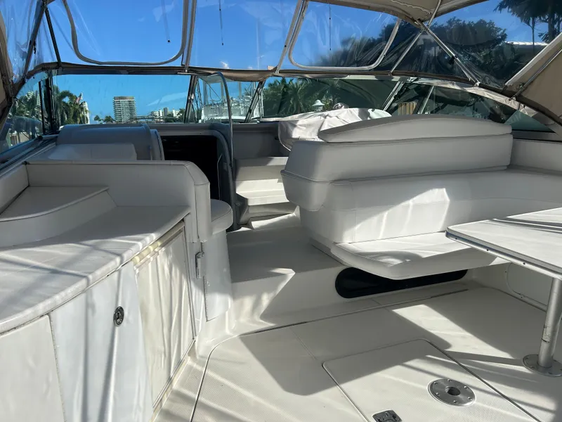 Slide: The Image of Spacious interior of 2001 Formula 41 PC yacht with white seating and clear canopy. - 8