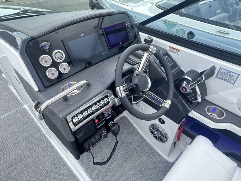 Slide: The Image of 2025 Formula 290 Bowrider helm with modern controls and sleek dashboard design. - 16