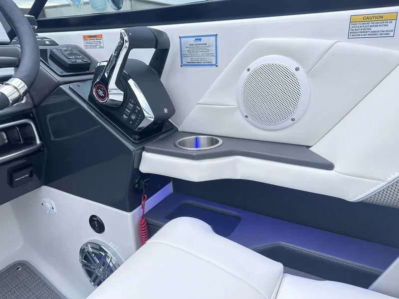 Slide: The Image of 2025 Formula 290 Bowrider interior with modern controls and speaker system. - 19