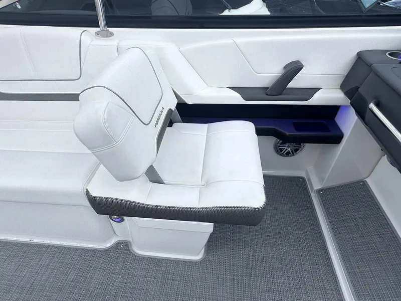 Slide: The Image of 2025 Formula 290 Bowrider interior with white seating and modern design. - 20