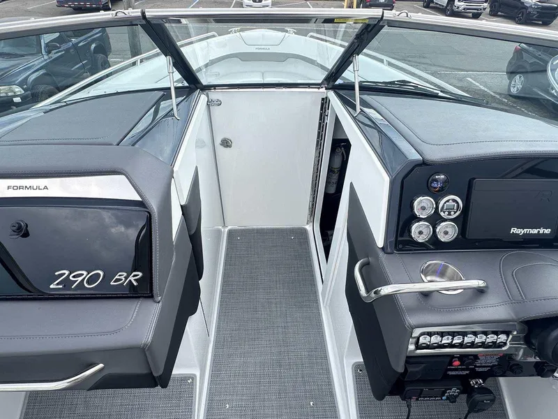 Slide: The Image of 2025 Formula 290 Bowrider interior with modern dashboard and seating. - 25