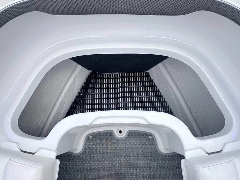 Slide: The Image of Interior view of 2025 Formula 290 Bowrider boat, featuring sleek seating and flooring design. - 33
