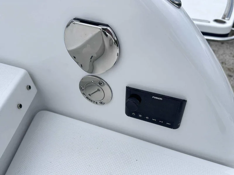 Slide: The Image of 2025 Formula 290 Bowrider boat controls and audio system detail. - 4
