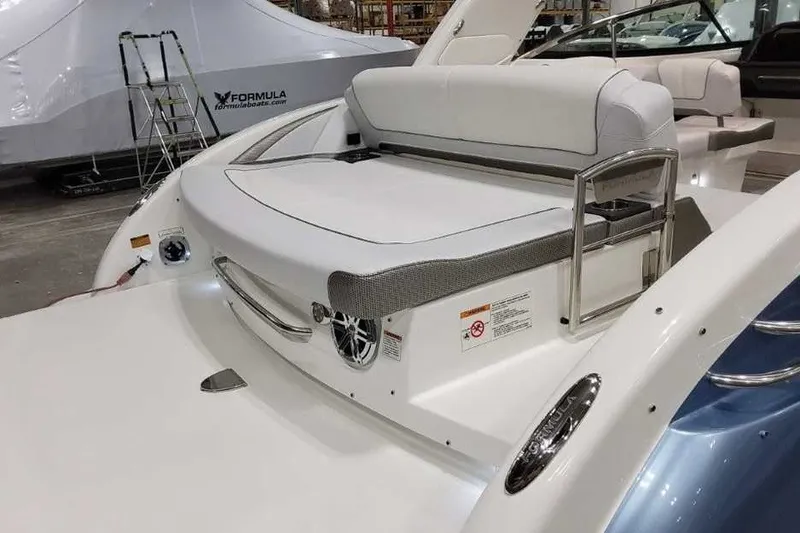 Slide: The Image of 2027 Formula 290 Bowrider boat interior with white seating and sleek design. - 8