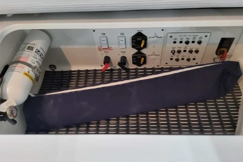Slide: The Image of Control panel of a 2027 Formula 290 Bowrider boat with safety equipment. - 15