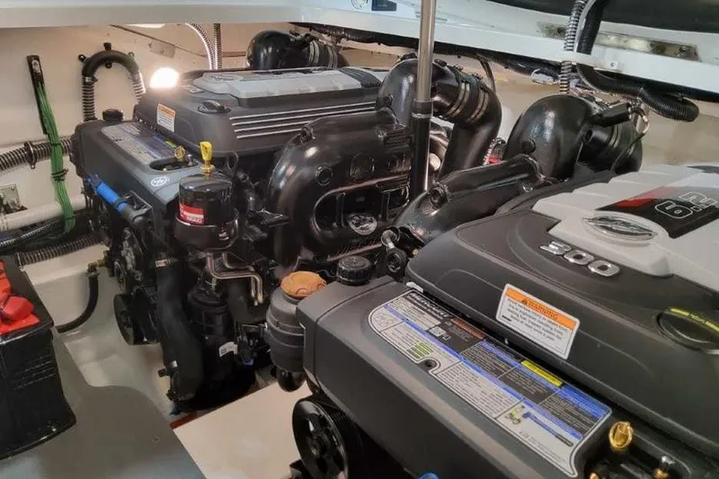 Slide: The Image of Engine compartment of 2027 Formula 290 Bowrider, showcasing dual powerful engines. - 17