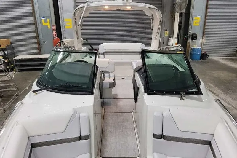 Slide: The Image of 2027 Formula 290 Bowrider boat interior in a warehouse setting. - 26