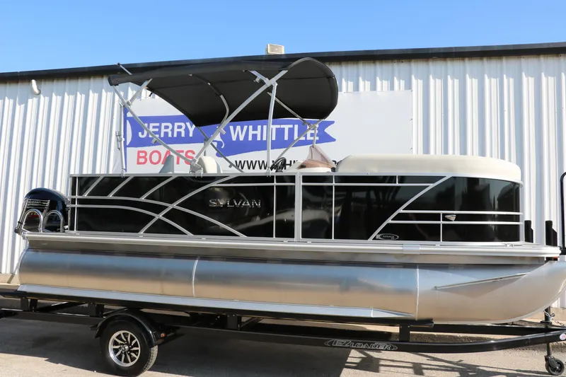The Image of 2025 Sylvan Mirage 820 PARTY FISH pontoon boat with canopy on trailer. - 1