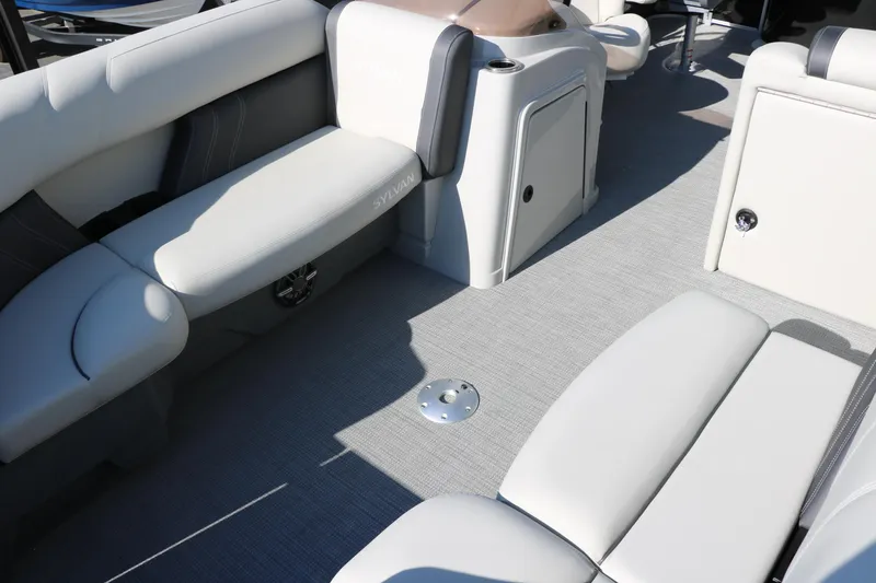 Slide: The Image of 2025 Sylvan Mirage 820 PARTY FISH interior with plush seating and modern design. - 12