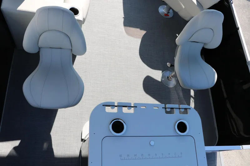 Slide: The Image of 2025 Sylvan Mirage 820 PARTY FISH boat interior with seating and table setup. - 17