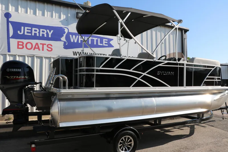 Slide: The Image of 2025 Sylvan Mirage 820 PARTY FISH pontoon boat on trailer at dealership. - 2