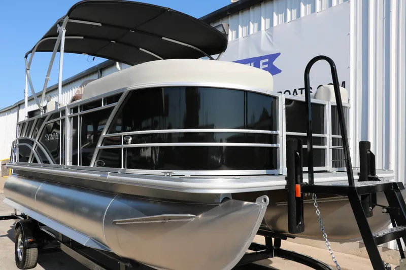 Slide: The Image of 2025 Sylvan Mirage 820 PARTY FISH pontoon boat on trailer, side view. - 7