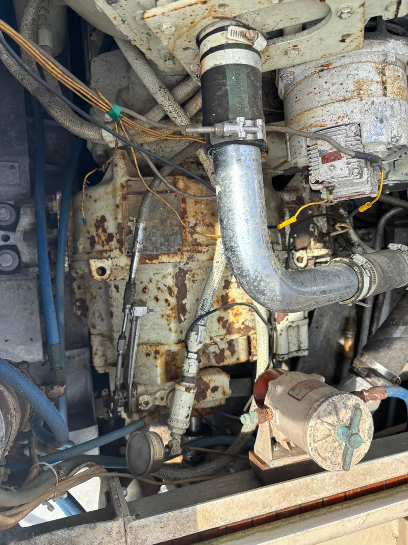 Slide: The Image of Rusty engine components of a 1974 Striker Canyon Runner boat. - 24