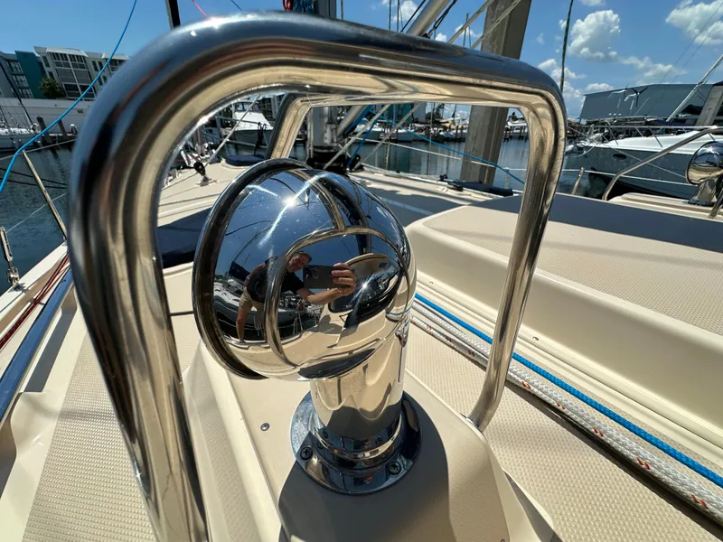 Slide: The Image of Close-up of a 2021 Island Packet 349 sailboat's polished metal fixture on deck. - 12