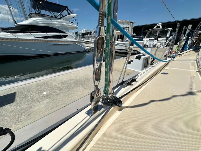 Slide: The Image of Island Packet 349 sailboat deck, docked at marina, 2021 model. - 16