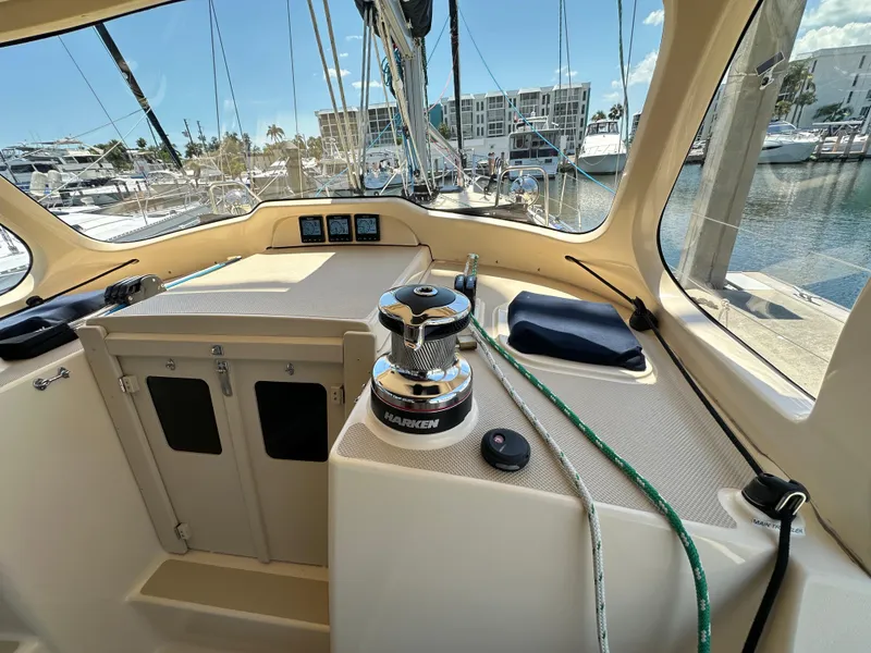 Slide: The Image of Cockpit of 2021 Island Packet 349 sailboat with winch and navigation instruments. - 23
