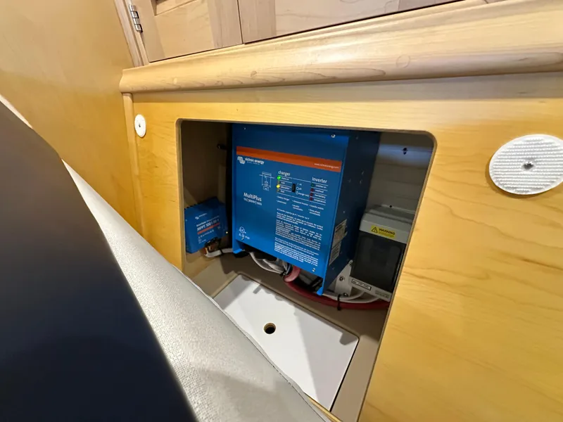 Slide: The Image of Electrical system inside 2021 Island Packet 349 yacht, featuring Victron Energy MultiPlus inverter. - 48