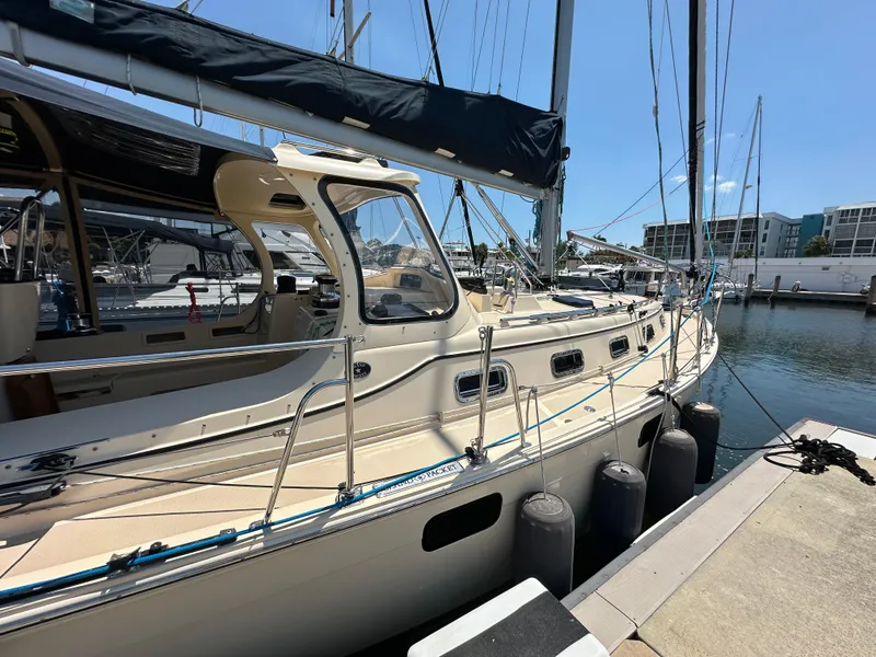 Slide: The Image of 2021 Island Packet 349 sailboat docked at marina, featuring sleek design and modern amenities. - 5