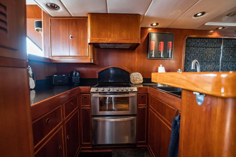 Slide: The Image of Luxurious wooden kitchen interior on a 1985 Lowland 68 Neth Ships yacht. - 15