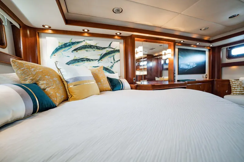 Slide: The Image of Luxurious yacht bedroom with elegant decor, featuring marine artwork and plush bedding, Lowland 68 Neth Ships. - 19