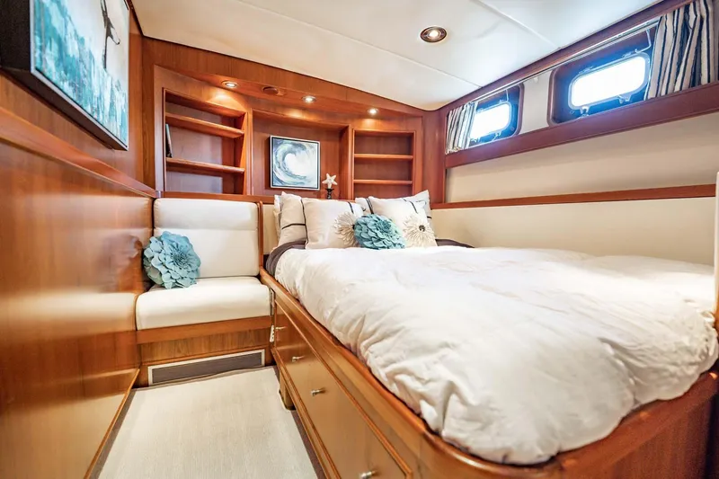 Slide: The Image of Luxurious cabin interior of 1985 Lowland 68 Neth Ships yacht with cozy bed and wooden decor. - 23