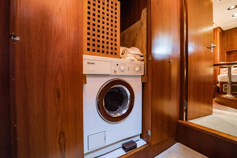 Slide: The Image of Laundry area with a washing machine inside a 1985 Lowland 68 Neth Ships yacht. - 27