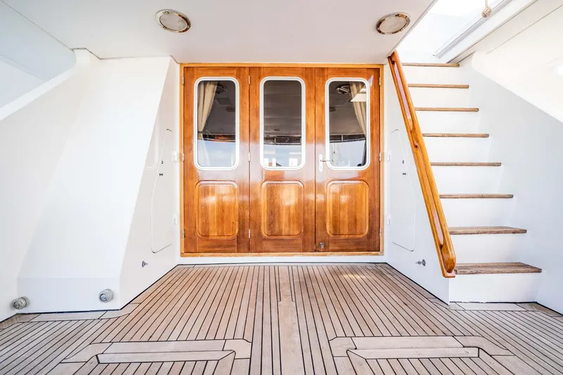 Slide: The Image of Elegant wooden doors and stairs on 1985 Lowland 68 Neth Ships yacht deck. - 34