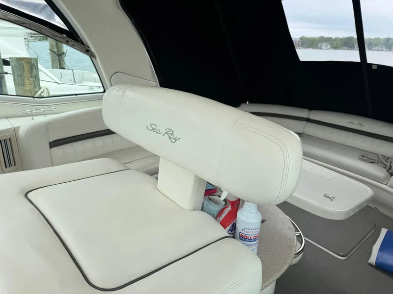 Slide: The Image of Interior of 2003 Sea Ray 500 Sundancer yacht with white leather seating. - 12
