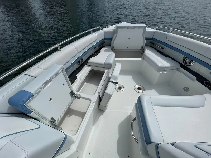 Slide: The Image of 2023 Formula 330 Crossover Bowrider OB interior with spacious seating and storage compartments. - 12