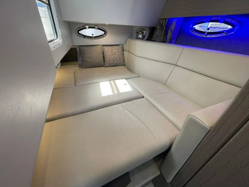 Slide: The Image of 2023 Formula 330 Crossover Bowrider OB interior with plush seating and modern design. - 16