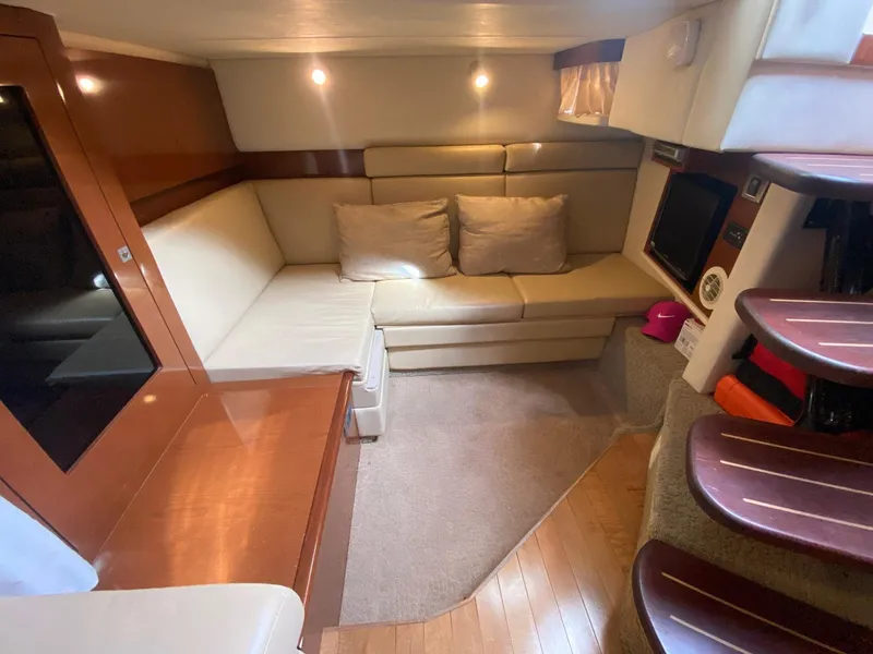 Slide: The Image of Interior of 2008 Sea Ray 38 Sundancer yacht with cozy seating and modern design. - 12