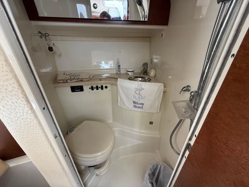 Slide: The Image of 2008 Hydra-Sports Vector 3500 VX boat bathroom with toilet, sink, and shower. - 11