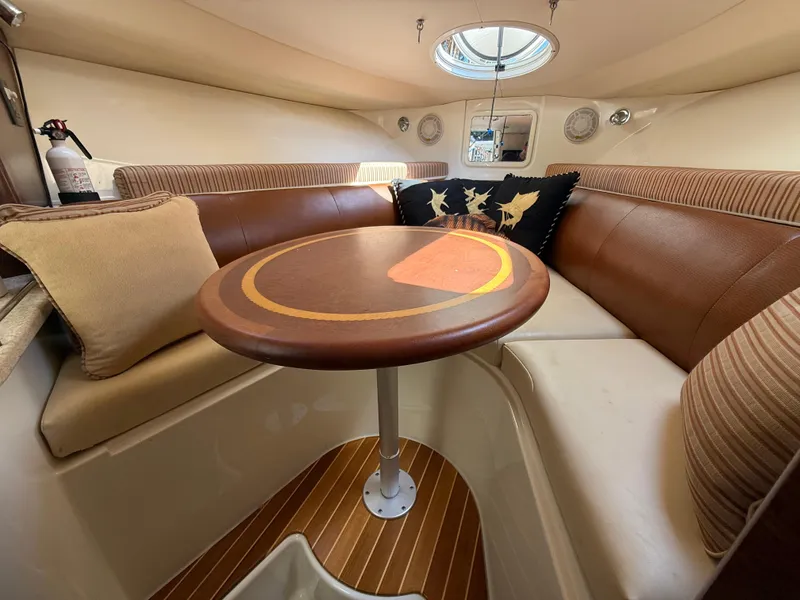 Slide: The Image of 2008 Hydra-Sports Vector 3500 VX cabin interior with seating and table. - 14