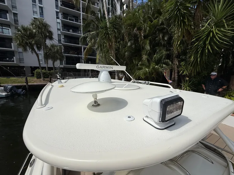 Slide: The Image of 2008 Hydra-Sports Vector 3500 VX boat with Garmin radar, docked near palm trees. - 20