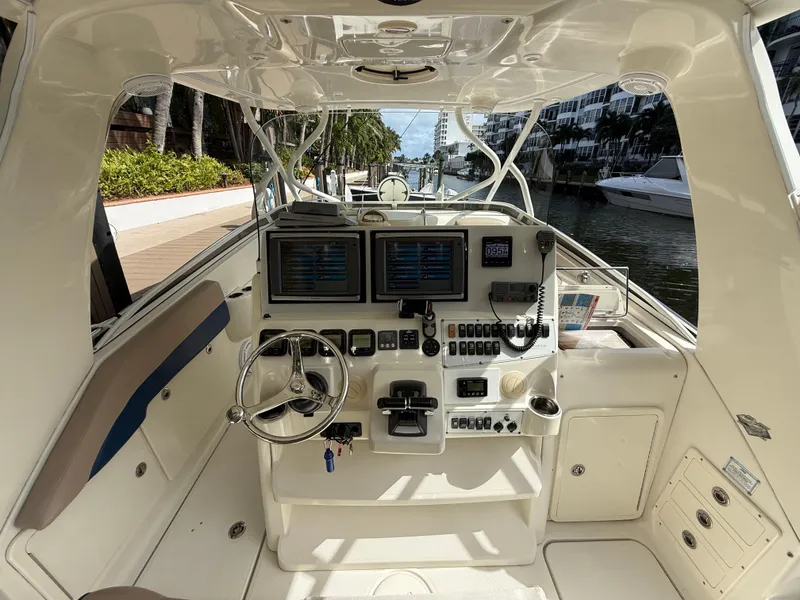 Slide: The Image of 2008 Hydra-Sports Vector 3500 VX boat cockpit with dual screens and steering wheel. - 28