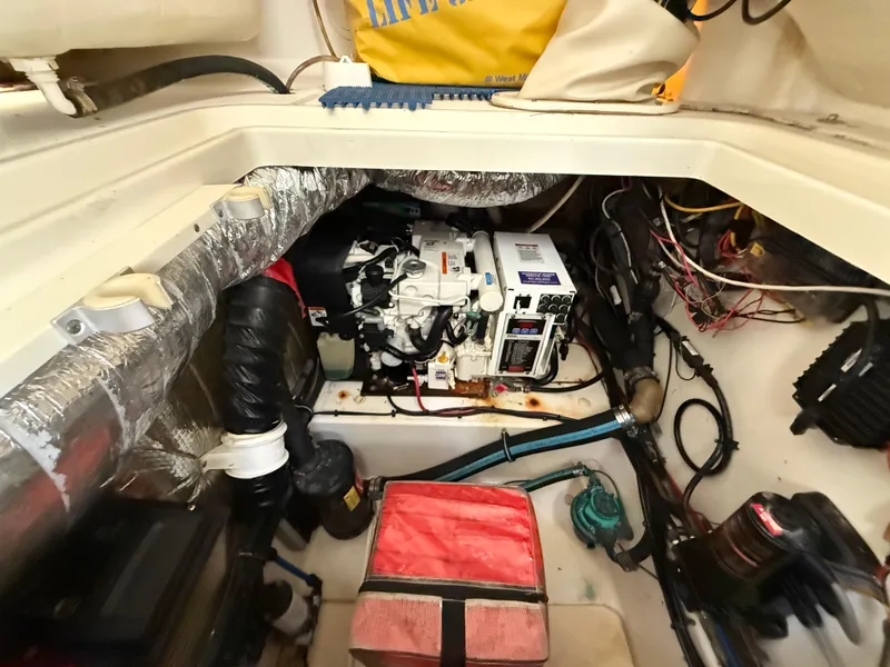 Slide: The Image of 2008 Hydra-Sports Vector 3500 VX engine compartment with wiring and equipment. - 30