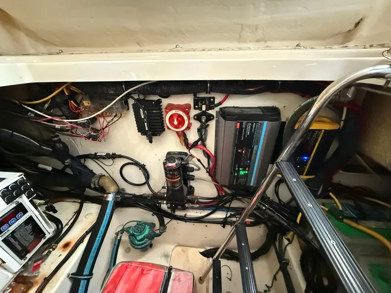 Slide: The Image of Electrical system inside a 2008 Hydra-Sports Vector 3500 VX boat, showing wiring and components. - 31