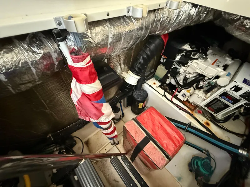 Slide: The Image of Engine compartment of 2008 Hydra-Sports Vector 3500 VX with equipment and storage items. - 32